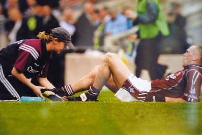 Jeanette Administering Physiotherapy to a Westmeath Player